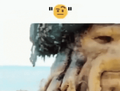 A Close Up Of A Tree Trunk With A Smiley Face Above It . GIF