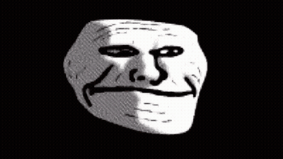 A Close Up Of A Troll Face On A Black Background GIF