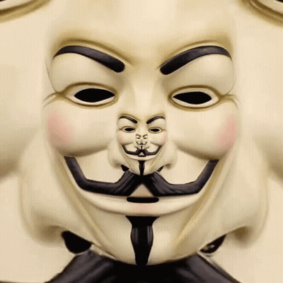 A Close Up Of A V For Vendetta Mask With A Mustache And Eyebrows GIF