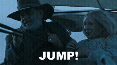 A Close Up Of A Wagon Wheel In Blue GIF