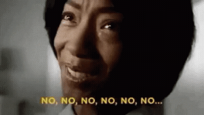 A Close Up Of A Woman Crying And Saying No . GIF
