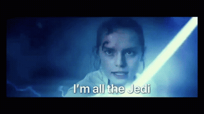 A Close Up Of A Woman Holding A Light Saber And Saying `` I 'M All The Jedi '' . GIF