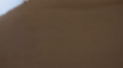 A Close Up Of A Woman Looking At A Man GIF