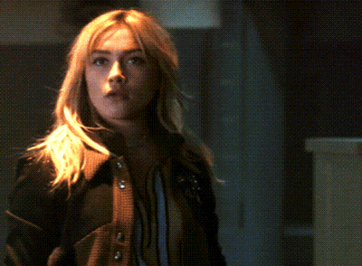 A Close Up Of A Woman Making A Funny Face GIF