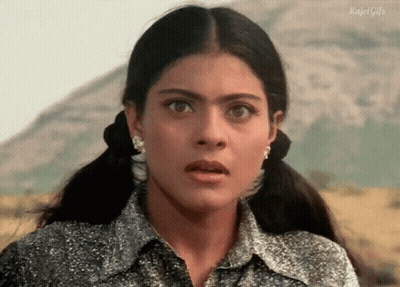 A Close Up Of A Woman Making A Surprised Face . GIF