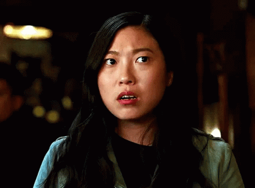 A Close Up Of A Woman Making A Surprised Face . GIF