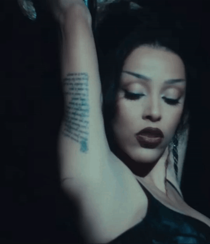 A Close Up Of A Woman 'S Arm With A Tattoo That Says ' I Love You ' On It GIF