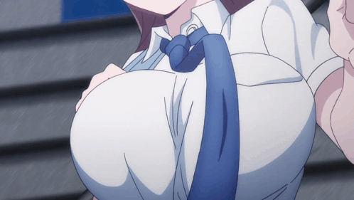 A Close Up Of A Woman 'S Breasts With A Blue Tie Around Her Neck GIF