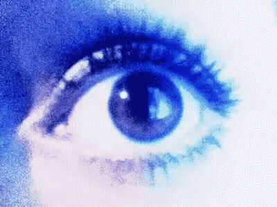 A Close Up Of A Woman 'S Eye With A Blue Background GIF