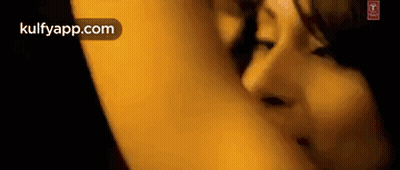 A Close Up Of A Woman 'S Face And A Man 'S Face In A Movie . GIF