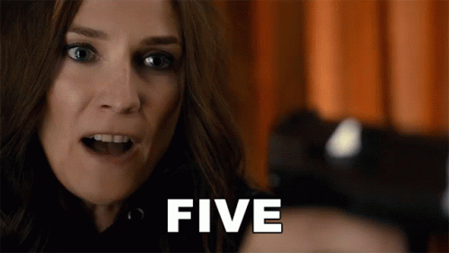 A Close Up Of A Woman 'S Face And The Word Five GIF