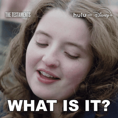 A Close Up Of A Woman 'S Face And The Words What Is It GIF