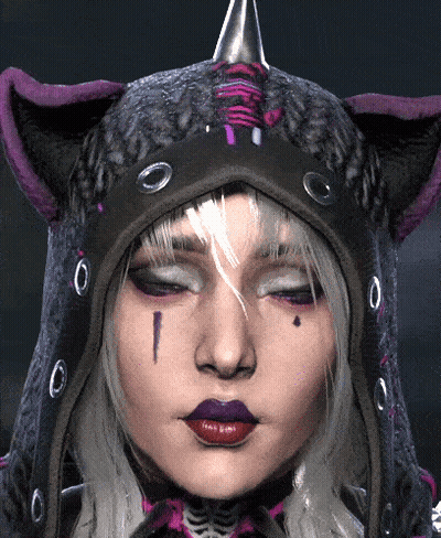 A Close Up Of A Woman 'S Face Wearing A Hooded Cat Hat GIF