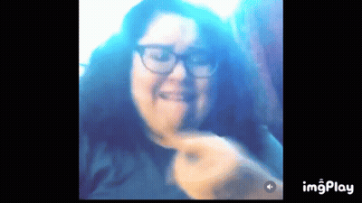 A Close Up Of A Woman 'S Face With A Blue Background And The Words Imgplay Below It GIF