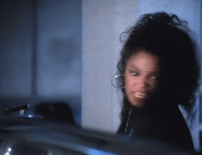 A Close Up Of A Woman 'S Face With A Blurred Background GIF