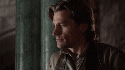 A Close Up Of A Woman 'S Face With A Blurred Background GIF