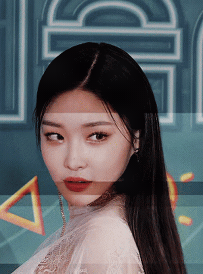A Close Up Of A Woman 'S Face With A Blurry Background And The Word Jc On It GIF