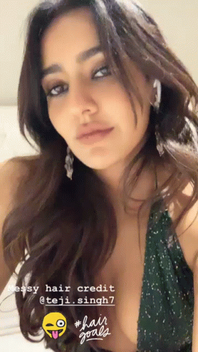 A Close Up Of A Woman 'S Face With A Caption That Says " Hair Goals " On It GIF