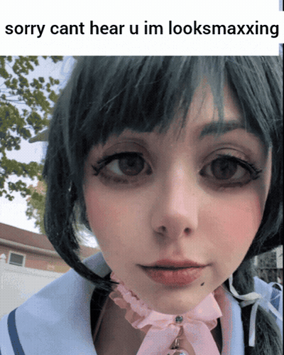 A Close Up Of A Woman 'S Face With A Caption That Says Sorry Cant Hear U Im Looksmaxxing GIF