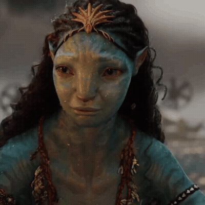 A Close Up Of A Woman 'S Face With A Crown On It GIF