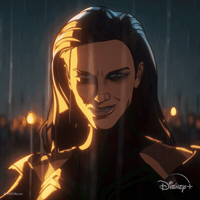A Close Up Of A Woman 'S Face With A Disney Logo In The Background GIF