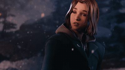 A Close Up Of A Woman 'S Face With A Hoodie That Has A Bird On It GIF