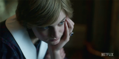 A Close Up Of A Woman 'S Face With A Netflix Logo Below Her GIF