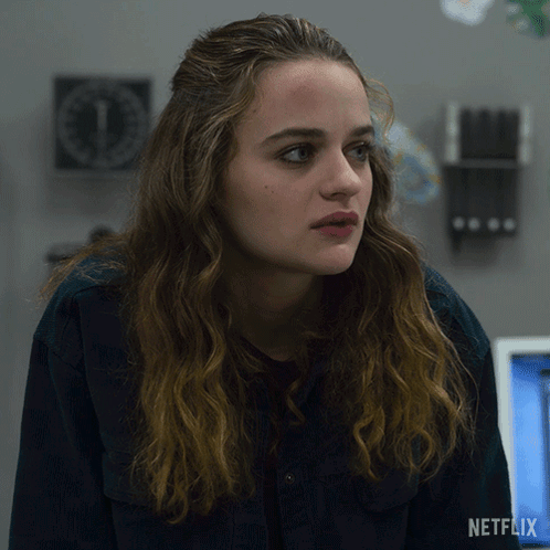 A Close Up Of A Woman 'S Face With A Netflix Logo On The Bottom GIF