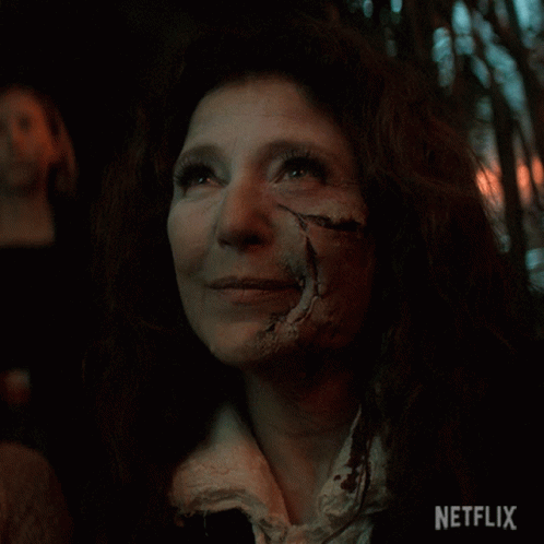 Close Up Of Woman's Face With Netflix Logo GIF