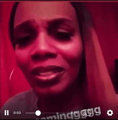 A Close Up Of A Woman 'S Face With A Red Background GIF