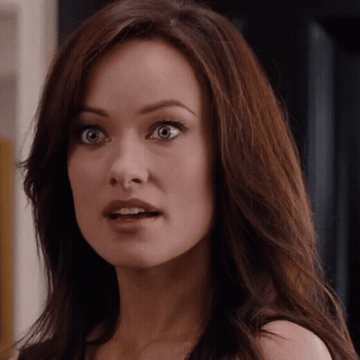 A Close Up Of A Woman 'S Face With A Surprised Expression GIF