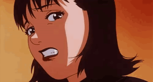 A Close Up Of A Woman 'S Face With A Surprised Look On Her Face . GIF
