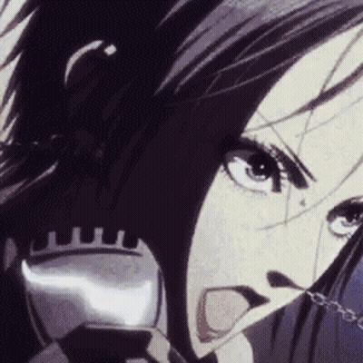 A Close Up Of A Woman 'S Face With A Sword In Her Mouth . GIF