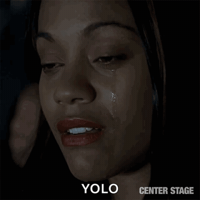 A Close Up Of A Woman 'S Face With A Tear Coming Out Of Her Eye And The Words Yolo Center Stage Below It GIF