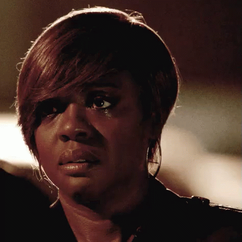 A Close Up Of A Woman 'S Face With A Tear Running Down Her Face GIF