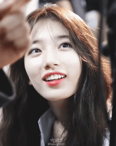 A Close Up Of A Woman 'S Face With A Watermark That Says @Capture94d10 GIF