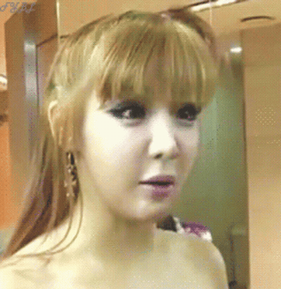 A Close Up Of A Woman 'S Face With A Watermark That Says ' J.m.p. ' GIF