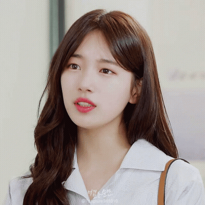 A Close Up Of A Woman 'S Face With A Watermark That Says Peablue941810 GIF