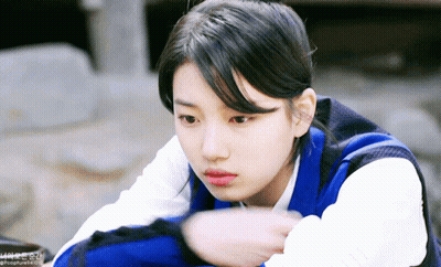 A Close Up Of A Woman 'S Face With A Watermark That Says ' Pocofure ' At The Bottom GIF