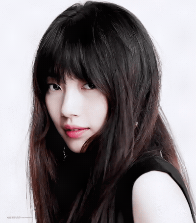 A Close Up Of A Woman 'S Face With A White Background And The Words ' Korean ' On The Bottom GIF