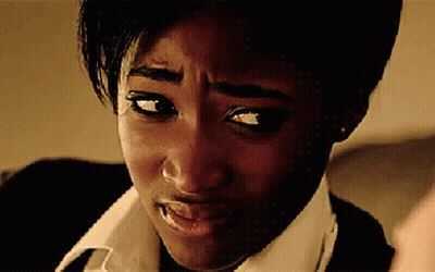 A Close Up Of A Woman 'S Face With A Wrinkle On Her Forehead GIF