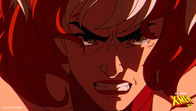 A Close Up Of A Woman 'S Face With A X-Men Logo In The Corner GIF