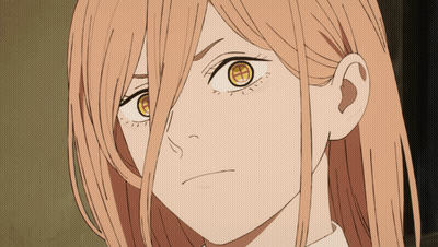 A Close Up Of A Woman 'S Face With A Yellow Eye GIF