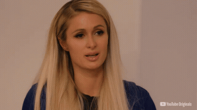 A Close Up Of A Woman 'S Face With A Youtube Originals Logo Behind Her GIF