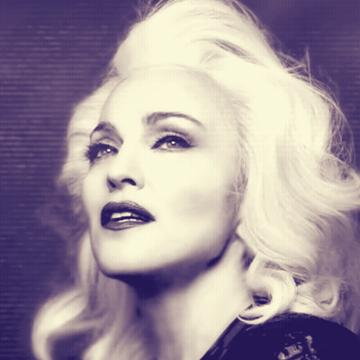 A Close Up Of A Woman 'S Face With Blonde Hair And Red Lips GIF