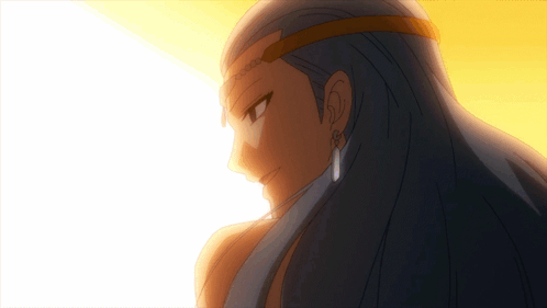 A Close Up Of A Woman 'S Face With Blue Hair And Earrings GIF