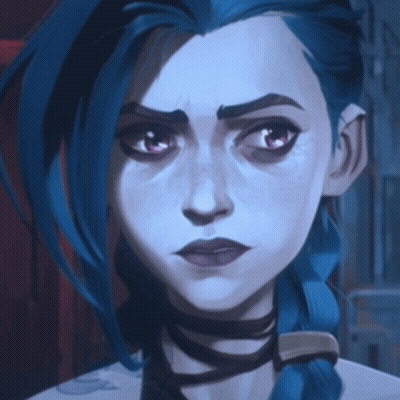 A Close Up Of A Woman 'S Face With Blue Hair GIF