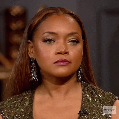 A Close Up Of A Woman 'S Face With Bravo Written On The Bottom GIF