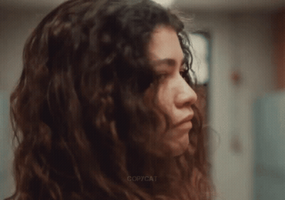 A Close Up Of A Woman 'S Face With Copycat Written On The Bottom Right GIF