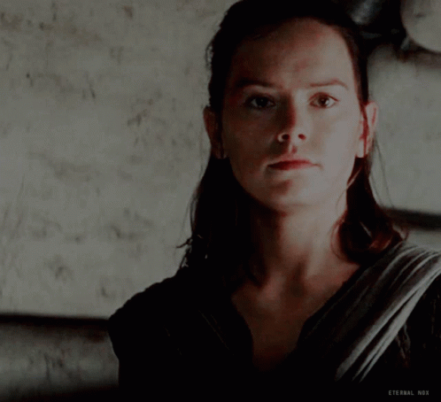 A Close Up Of A Woman 'S Face With Eternal Nox Below Her GIF